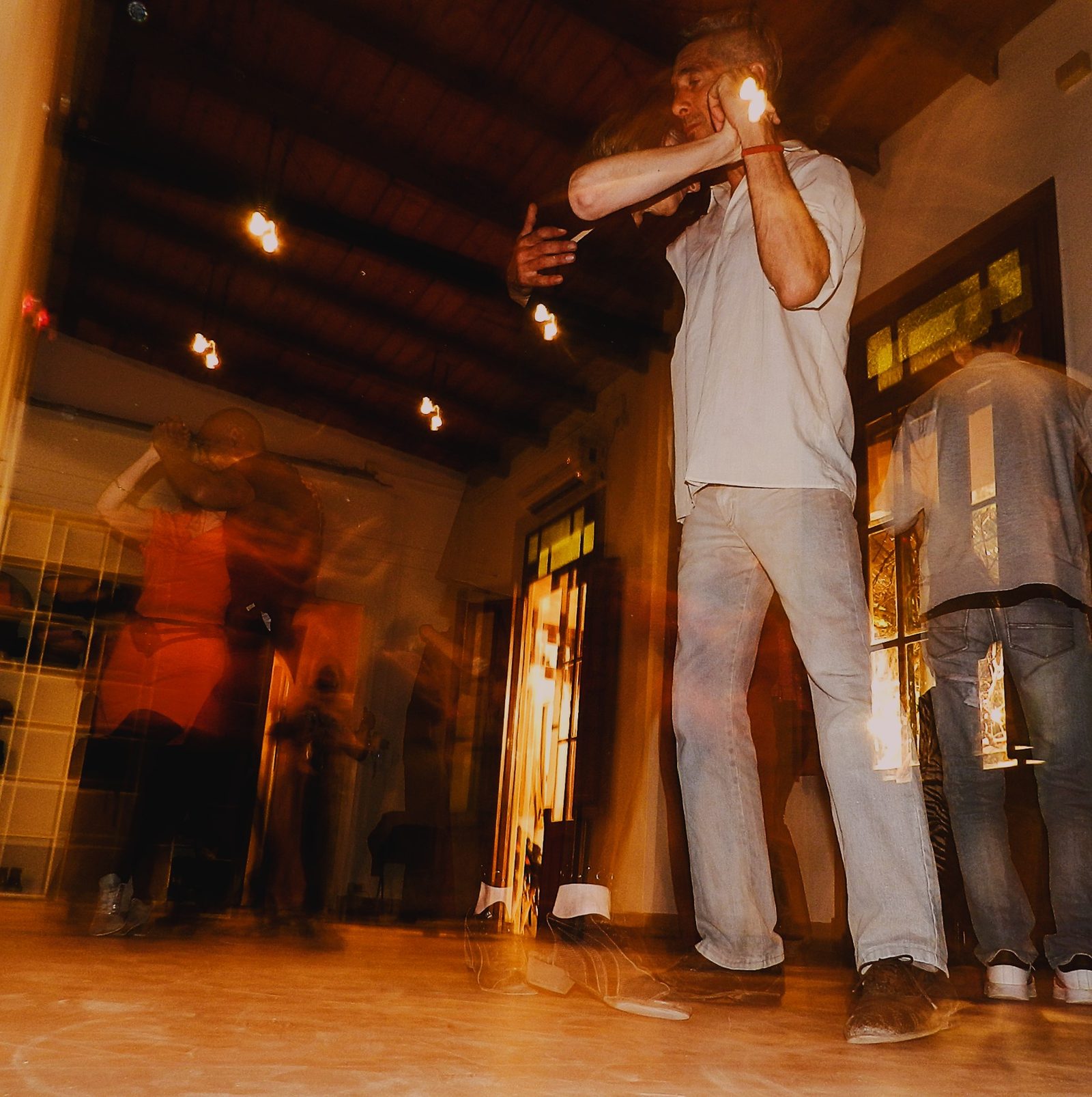 Night practice by candlelight, with trails of movement